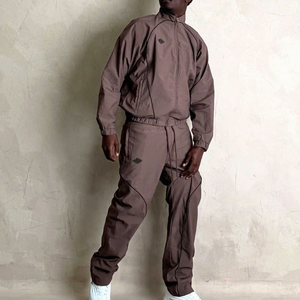 <b>Tracksuits</b> made from 100% nylon with <b>plain</b> dyed techniques designed comfortable and stylish activewear sets - Product Image 2