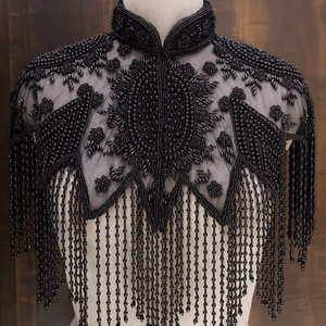 เสื้อครอปถักโครเชต์แฮนด์เมด ไร้แขน ประดับมุก พู่ห้อย เซ็กซี่ โชว์หลังเว้า ดีไซน์โปร่ง สำหรับฤดูร้อน วันหยุดพักผ่อน ชายหาด - Product Image 1