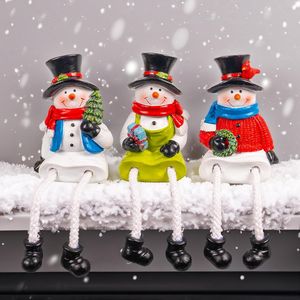 Set di 3 Statuette in Resina di Babbo Natale e Pupazzo di Neve con Gambe Pendenti, Decorazioni per Tavolo, Caminetto e Mensole Natalizie - Product Image 1