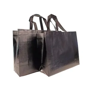 निः शुल्क नमूना पुनः प्रयोज्य गैर बुना हुआ प्रचार किराने की खरीदारी बैग काले टुकड़े गैर-बुने कस्टम मुद्रित डिजाइन के साथ
