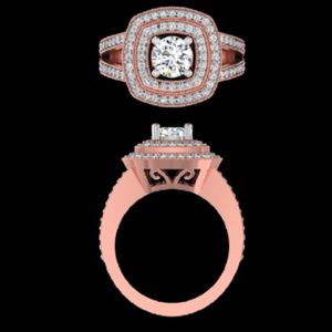 Anillo de compromiso con halo escalonado de diamantes redondos brillantes en oro rosa de 18 quilates con banda ancha adornada con pavé para mujer - Product Image 3