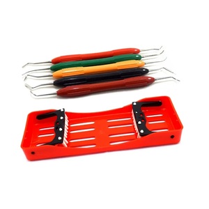 Kit d'instruments manuels pour composites dentaires avec poignée en silicone, cassette de stérilisation, instruments chirurgicaux dentaires restauratifs - Product Image 1