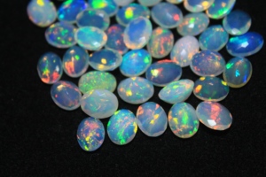 <b>7</b>*9mm White Opal Gemstone Oval Faceted Cut Super Fine Quality - Product Image 4