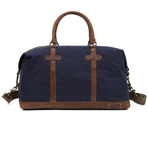 Premium Vintage Canvas Travel Duffle Bag Large Capacity Weekender with Genuine Leather Trim and Brass Hardware - Product Image 2