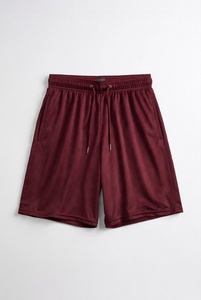 Shorts de sport marron avec poches à cordon de serrage et coupe décontractée, idéal pour les tenues de sport décontractées en studio. - Product Image 1
