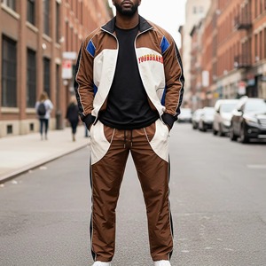 Ensemble de survêtement en nylon bicolore pour homme OEM, 2 pièces, streetwear, veste coupe-vent zippée, pantalon parachute à jambes larges, logo personnalisé - Product Image 1