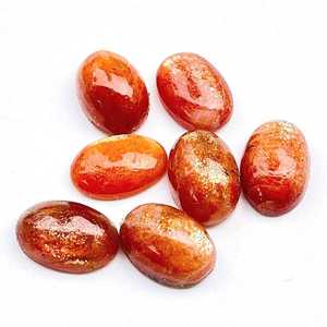 Lote al por mayor de piedras preciosas sueltas calibradas de piedra solar natural ovalada de 5x7 mm con parte trasera plana para fabricación de joyas - Product Image 1