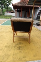 Fauteuil de relaxation Enjoy Chair en fibres naturelles tissées, structure en bois artisanale, écologique, style moderne minimaliste, mobilier d'intérieur.