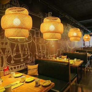Abat-jour suspendus artisanaux vietnamiens en rotin, jonc de mer et bambou – Luminaires suspendus naturels tissés à la main pour la maison, les cafés et les restaurants - Product Image 1