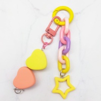 Meilleures ventes : Porte-clés en PVC en forme de cœur, imprimé UV, avec breloque de sac en alliage de zinc, mignon et tendance pour sacs à main