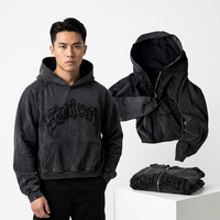 Sweat à capuche oversize noir en coton avec logo imprimé en relief, poche avant, coupe courte, style automne pour homme