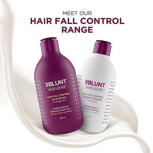 Strengthening <b>shampoo</b> <b>and</b> <b>conditioner</b> set with pea protein <b>and</b> caffeine designed to reduce <b>hair</b> fall <b>and</b> improve <b>hair</b> resilience - Product Image 2