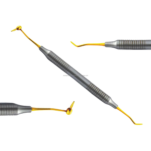 Instrumento Dental de Composite con Punta de Oro, Mango de Titanio Moleteado, Herramienta Restauradora Manual Ergonómica, Equipo Quirúrgico Clase I - Product Image 1