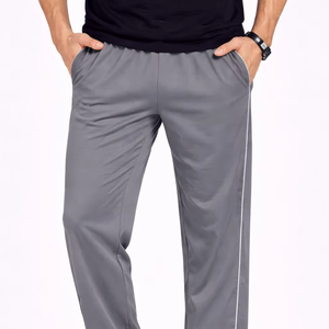 Pantalones deportivos grises premium para hombre, diseñados para brindar comodidad, movilidad y versatilidad diaria. Tela ligera y transpirable - Product Image 1