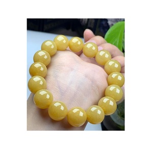 Bracelet classique en résine jaune à perles, bijoux de mode unisexe, forme de boule ronde, style élégant, disponible chez Worldwide Supply - Product Image 3