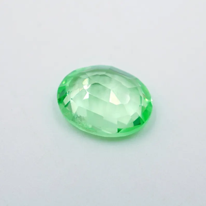 พลอยแซฟไฟร์สีเขียวเพาะเลี้ยงในห้องปฏิบัติการที่ได้รับการรับรองจาก HAYAAT GEMS น้ำหนัก 3.10 กะรัต รูปทรงวงรี (10x8x4 มม.) รุ่น N-154 สำหรับทำเครื่องประดับ ผลิตในอินเดีย - Product Image 4