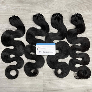 Cheveux naturels ondulés en trame, couleur naturelle, 100% cheveux humains vietnamiens, en stock, fournisseur de premier plan - Product Image 1