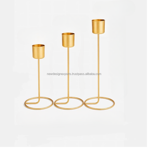 Soportes Esculpidos de Oro de Primera Calidad – Juego de 3 Elevadores de Mesa Contemporáneos - Product Image 1