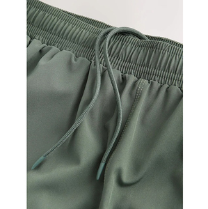 Shorts de sport décontractés pour hommes, couleur unie, taille mi-haute, à séchage rapide, avec poches, couleur verte - Product Image 5
