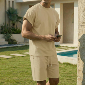 Conjunto deportivo informal de dos piezas para hombre, ecológico, que absorbe la humedad, con camiseta de manga corta y pantalones cortos para entrenamiento. - Product Image 3