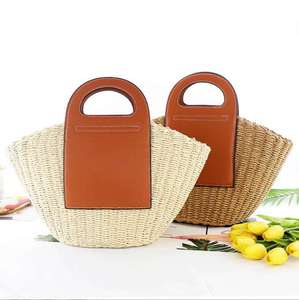 Upgrade your daily accessory collection with this premium Natural yarn bag designed with a large leather patch and <b>top</b> handles - Product Image 5