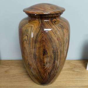 Traditional Hand Carved Wooden Cremation <b>Urn</b> with Detailed Lid Design and Warm Natural Finish for Honoring Loved Ones - Product Image 3