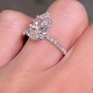 Bague de fiançailles pour femme avec halo caché, 3 carats, taille poire, or blanc 14K, sertie pavé, ornementée de pierres de laboratoire, cadeau d'anniversaire - Product Image 1
