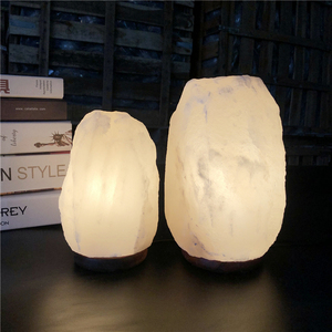 Stylish Himalayan white salt lamp made from genuine natural <b>crystal</b> offering beautiful illumination and elegant decorative - Product Image 1