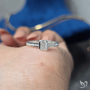 Delicate 0.50ct radiant cut lab grown diamond <b>ring</b> bezel <b>set</b> minimalist engagement <b>ring</b> with channel band in 10k white gold - Product Image 5