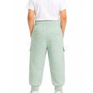 Nouveau pantalon cargo tendance pour enfants, fermeture boutonnée, couleur unie, coupe ample, léger et respirant en tissu peigné, vente en gros - Product Image 4