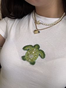 Elegante Top sin Mangas con Bordado de Cuentas Premium para Mujer, con Artesanía Hecha a Mano y un Look Moderno - Product Image 1