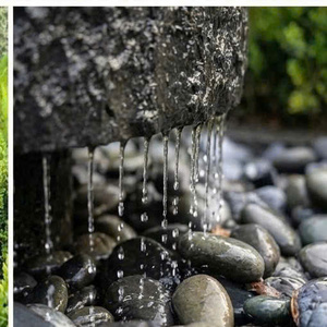 Fontaine en bassalte naturel taillé brut - Diamètre 115 cm - Grande fontaine extérieure au design moderne - Bassin d'eau en pierre volcanique massif - Product Image 5