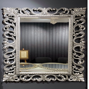 Espejo rectangular plateado moderno con un marco de diseño abierto y llamativo; disponible a precios de mayorista. - Product Image 1