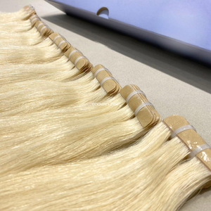 Extensions de cheveux vietnamiens à texture naturelle, technique TAPE IN avec méthode slavie pour des extensions invisibles. - Product Image 2