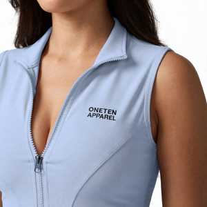 เสื้อโยคะผู้หญิง ONETEN APPAREL ผ้ายืดสี่ทิศทาง ทรงเข้ารูป คอตั้ง แขนกุด ซิปครึ่งตัว ด้านหน้ามีโลโก้ - Product Image 5