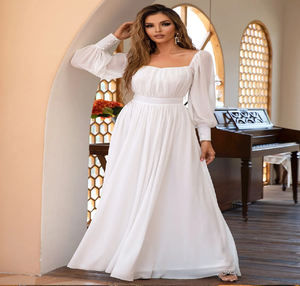 Impresionante vestido maxi blanco con mangas abullonadas y corte en A para eventos nupciales, ahora disponible a precios de mayorista para compradores de artículos de lujo. - Product Image 1
