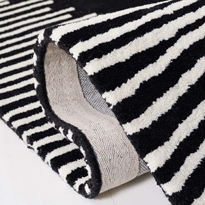Tapis moderne noir et blanc à motif soleil, tapis contemporain en laine de Nouvelle-Zélande tufté à la main pour le salon, la chambre et la décoration de bureau - Product Image 1