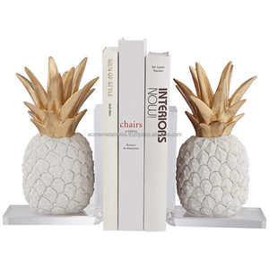 Porte-livres en métal en forme d'ananas, finition dorée et blanche, idéal pour les livres lourds sur le bureau - Product Image 1