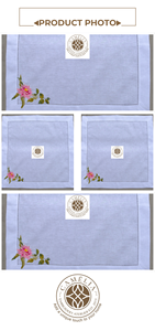Broderie délicate de lotus sur une serviette en lin blanc épuré, ajoutant une touche florale sereine et un charme élégant. - Product Image 3