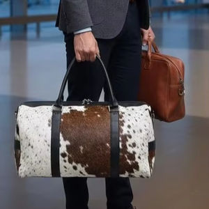 กระเป๋าเดินทางหนังวัวแท้ขนปุย ขนาดใหญ่ ความจุเยอะ ทำมือ น้ำหนักเบา มีซิป พกพาสะดวกอเนกประสงค์ รุ่น LHDB-0061 - Product Image 1