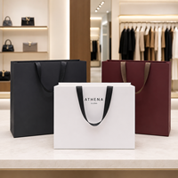 Sacs en papier de luxe pour cartes d'art avec poignée en ruban, enduits naturels et stratifiés par points UV pour l'emballage de vêtements et de chaussures