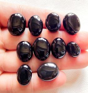 Cabochon en onyx noir naturel |   Pierre précieuse en onyx noir poli ovale |   Pierre pour la fabrication de bijoux en gros - Product Image 6