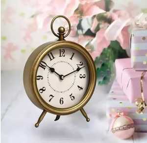 Trending Vintage Brass Round <b>Table</b> <b>Clock</b> Elegant Black Numerals Classic Two Leg Support Golden Frame Festive Nostalgic Stylish - Product Image 1