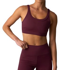 เสื้อชั้นในกีฬาผู้หญิงไร้ตะเข็บ ซัพพอร์ตการออกกำลังกาย ฟิตเนส โยคะ ชุดออกกำลังกาย เนื้อผ้านุ่ม ยืดหยุ่น รับผลิตแบบ OEM พร้อมสกรีนโลโก้ ขายส่ง - Product Image 5