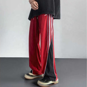 Pantalones Deportivos OEM 100% Nailon para Hombre, Cintura Elástica, Corte Holgado, Franja Lateral, Estampado Personalizado, Venta al Por Mayor, Exportación, Suministro de Fábrica - Product Image 4