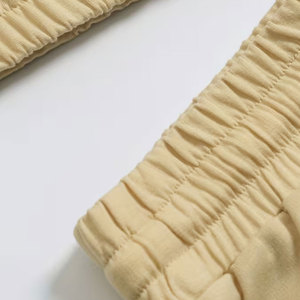 Ensemble haut court jaune sans manches et jupe crayon assortie pour femme, tenue confortable en coton deux pièces pour un usage décontracté - Product Image 4