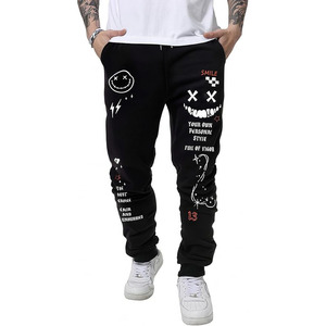 Men's Graphic Print Knot Front Sweatpants <b>Drawstring</b> Elastic Waist <b>Trousers</b> with Pockets - Product Image 1
