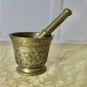 Elegant brass mortar pestle set with traditional carved scrollwork body pattern, available at wholesale prices. - Product Image 1