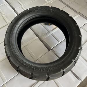 Pneu pneumatique noir SHENG-I 100/65-9 11 pouces (11") sans chambre à air en nylon pour scooter électrique Merits Regal Raptor et fauteuil roulant. - Product Image 1