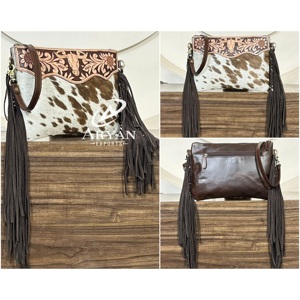 กระเป๋าหนังวัวแท้สลิงสไตล์ทันสมัยปี 2026 ตกแต่งด้วยลายฉลุ  พร้อมพู่ห้อย  กระเป๋าสะพายไหล่หนังขนสัตว์สำหรับผู้หญิง ราคาโรงงาน - Product Image 1